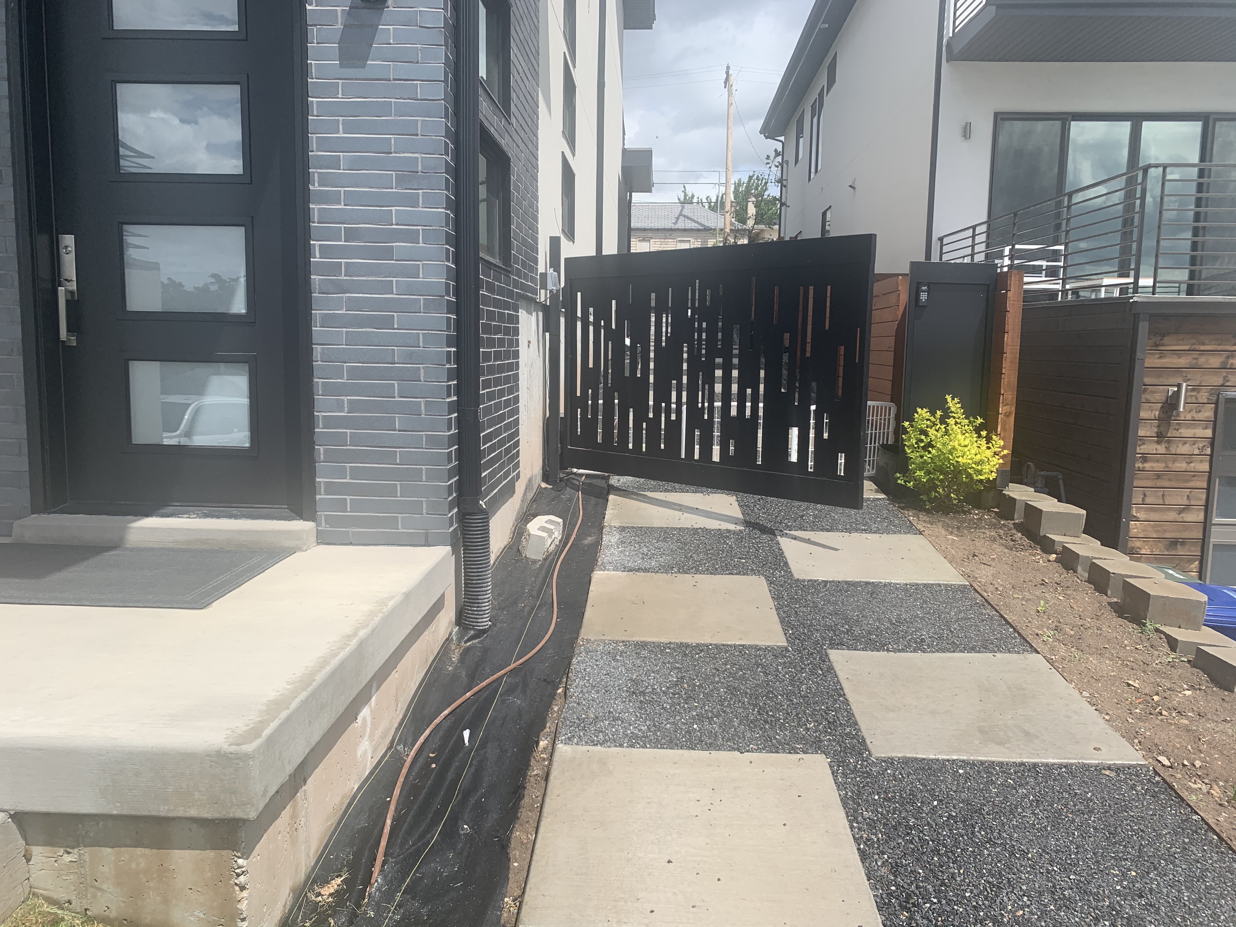 IMG-3263 Paving job on the side of a new residential home