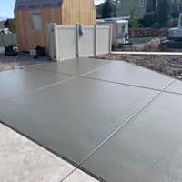 CONCRETE AT JESSE NUTTALS HOME 2019 Fresh concrete near backyard's shed