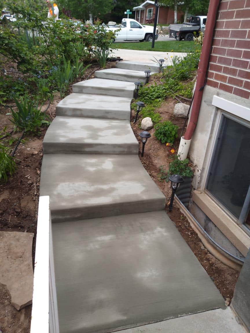 CONCRETE STAIRS DIANE ROBBINGS 11-12-2020 Concrete steps leading to the side of a home