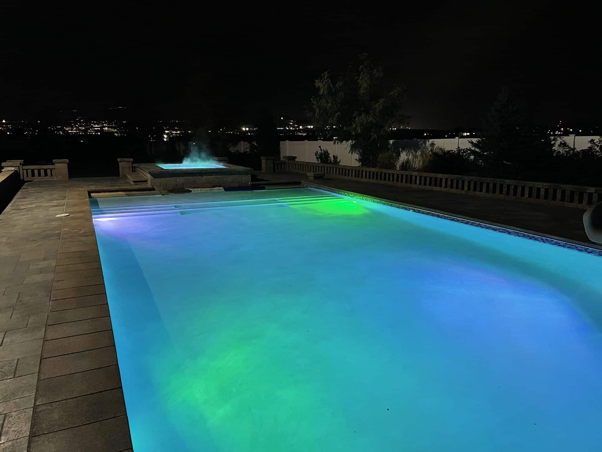 IMG-1178 Finished swimming pool at night with colored lights