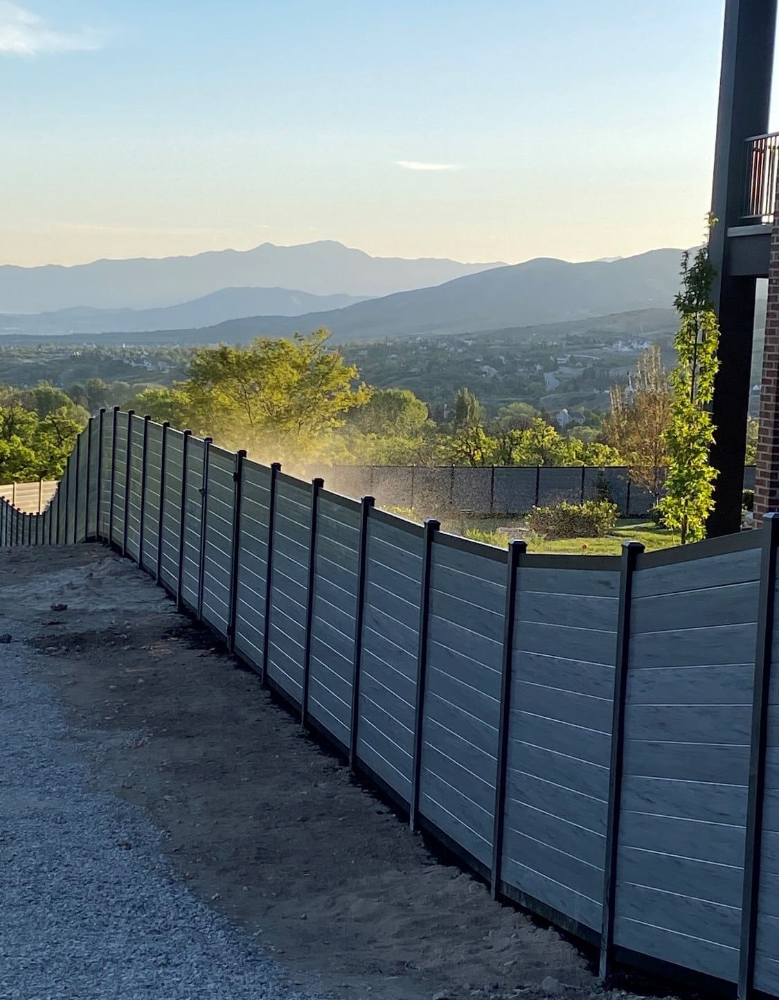 Av10 New built fence running down a hill