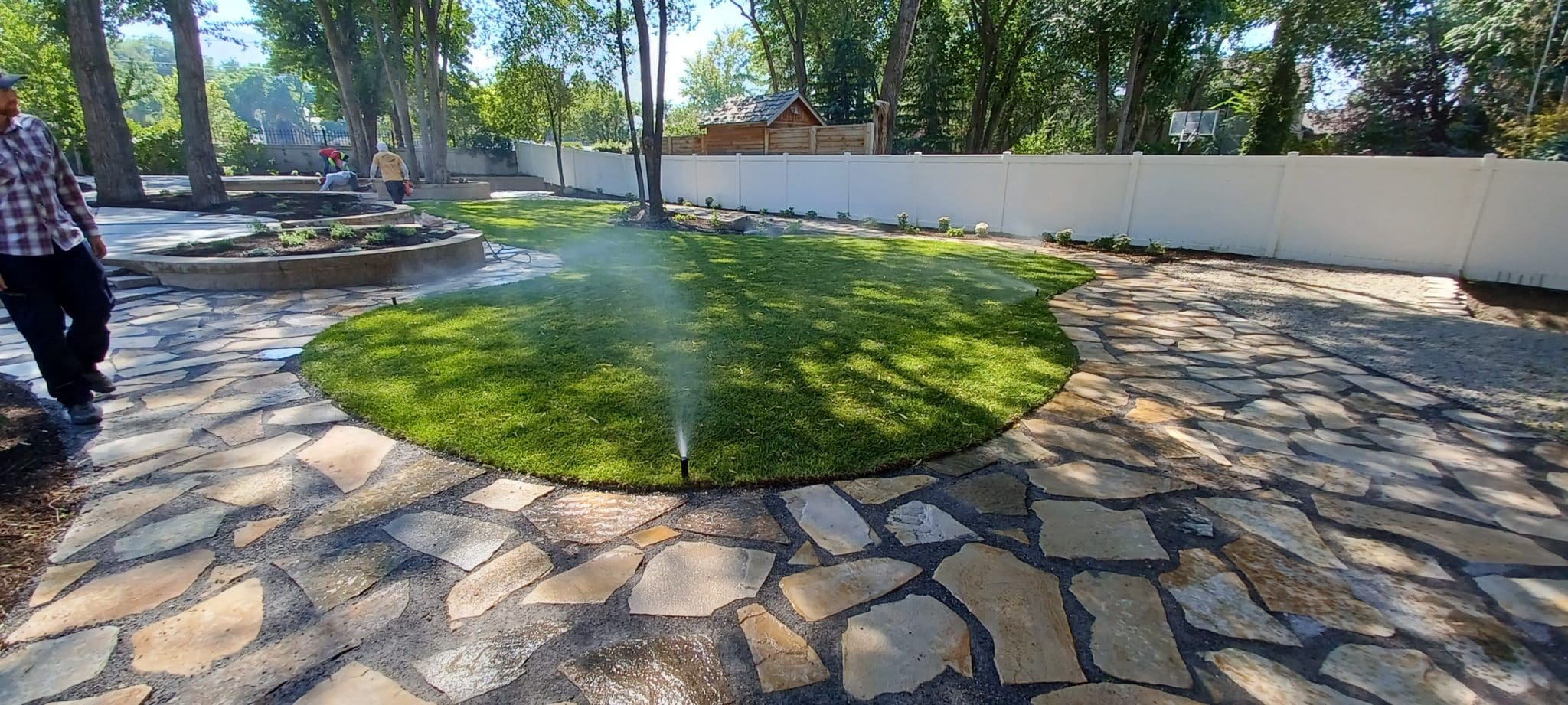 FLAGSTONE PATH Walkway around a fresh patch of grass