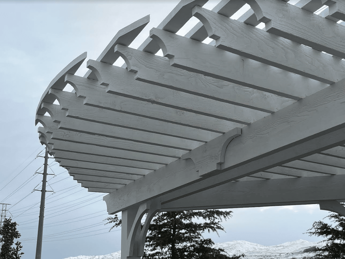 Screen Shot 2023-01-25 at 3.16.35 PM Pergola built in a home's back yard view from under