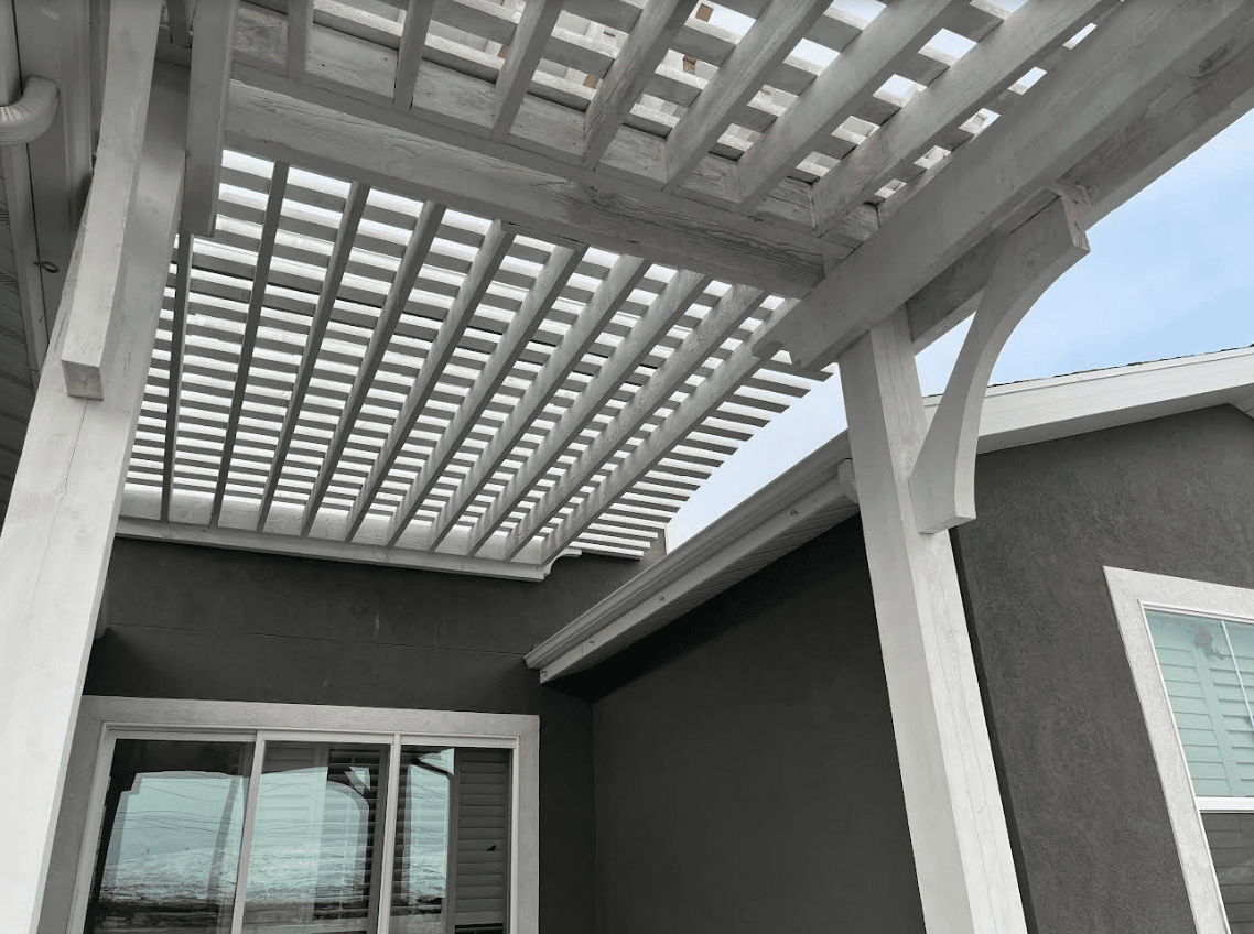 Screen Shot 2023-01-25 at 3.17.24 PM White pergola built on back yard