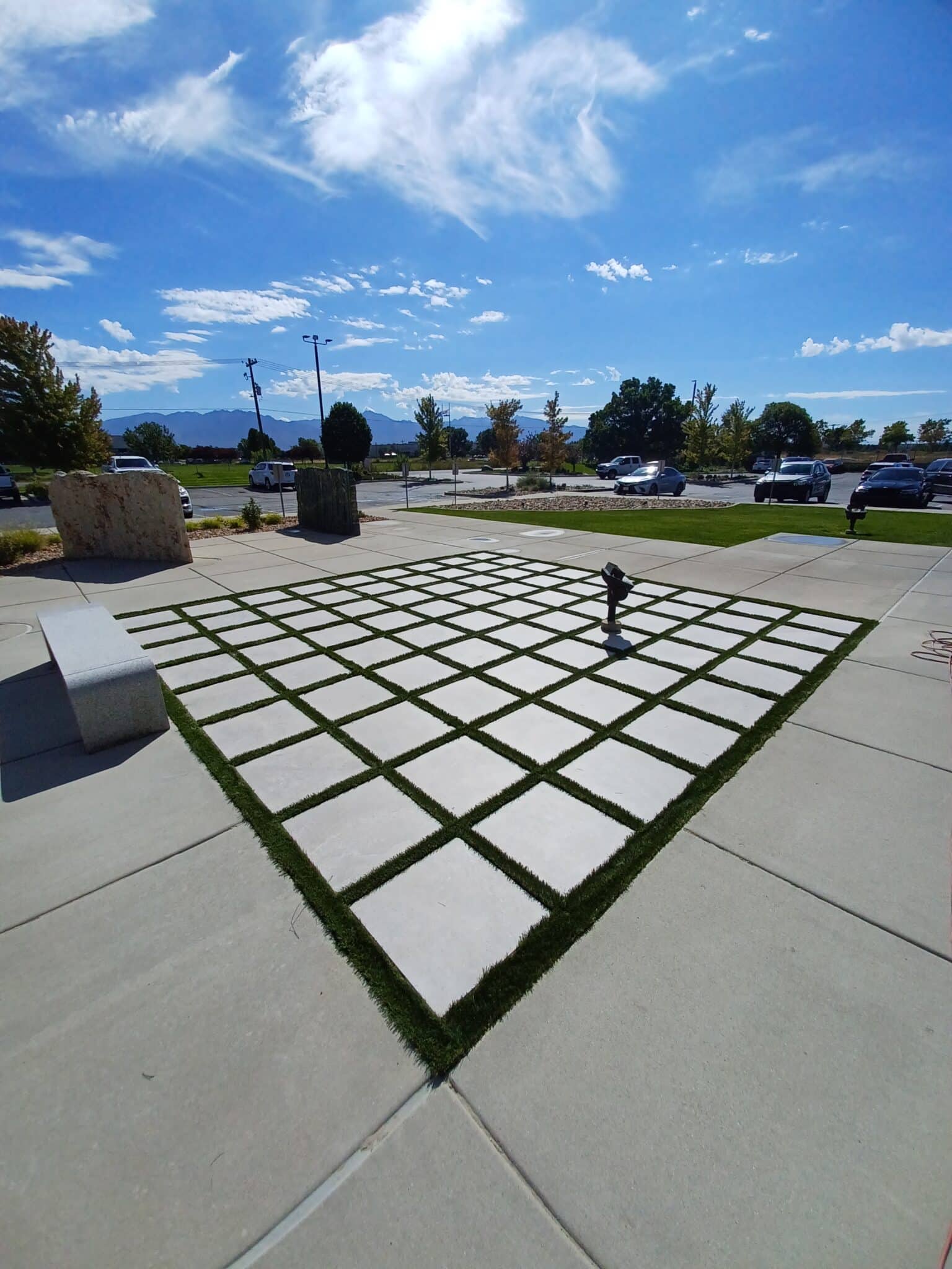 20230920_113332 Side angled view of new walkway path added in front of a business.