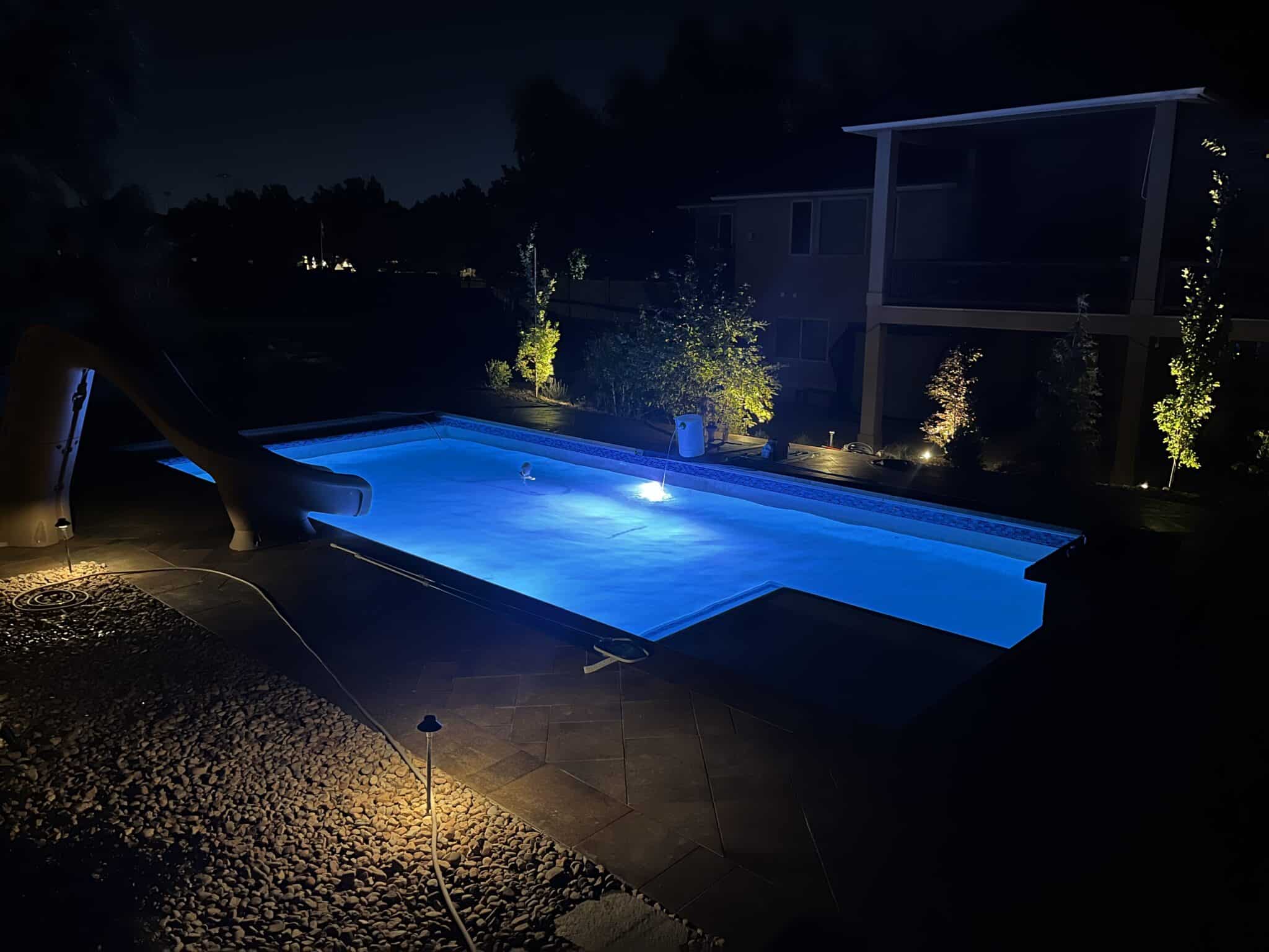 IMG-5949 New swimming pool installation with blue light in the dark.