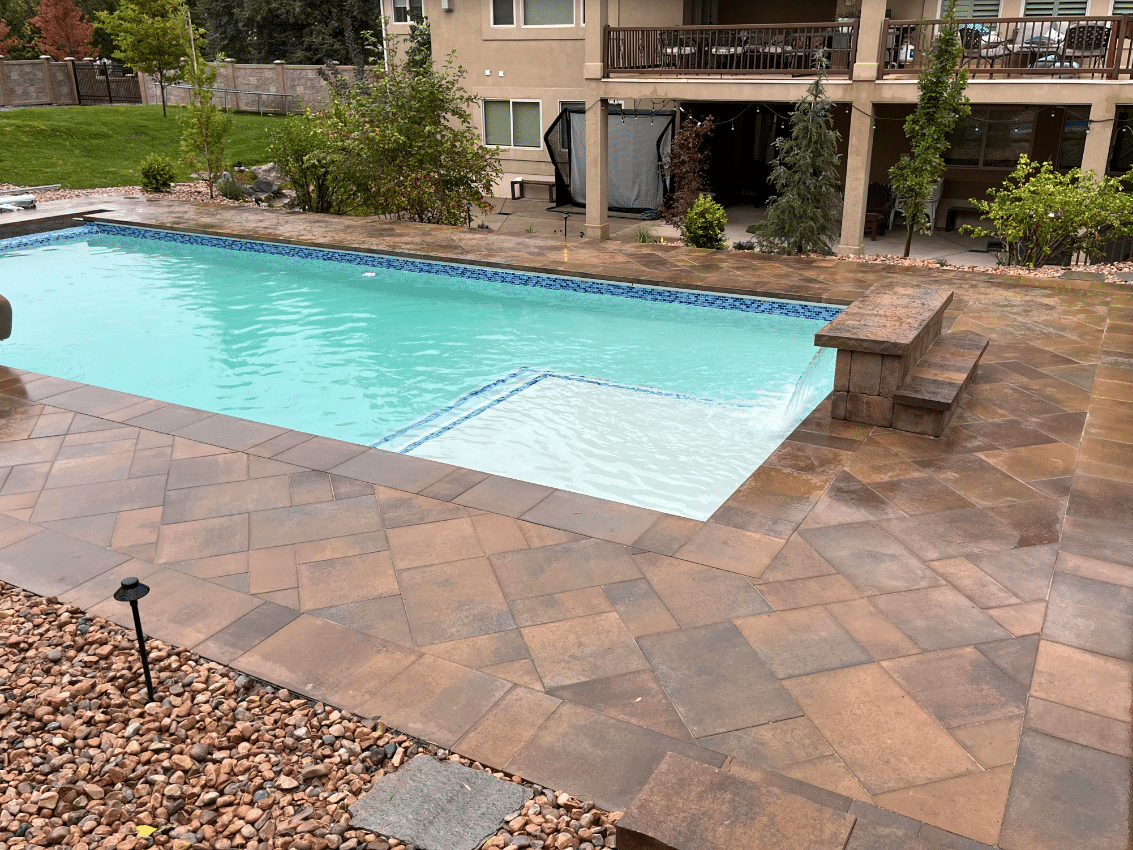Screen Shot 2023-10-12 at 4.21.54 PM New custom swimming pool installed with masonry and a water fall