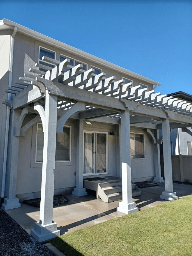 Screen Shot 2023-10-18 at 3.41.14 PM Patio pergola built onto the back of a house
