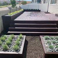 DECK WITH STAIRS AND PLANTER Custom deck with stairs and planter boxes