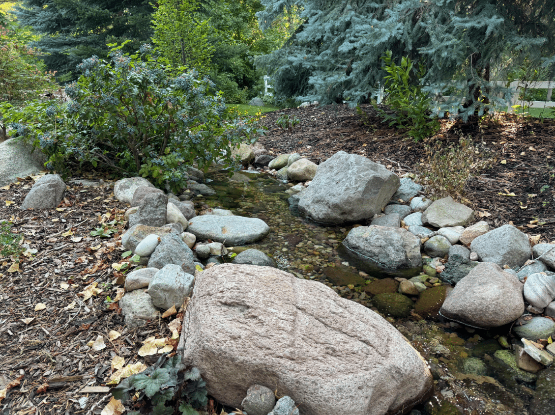 Screen Shot 2024-08-08 at 11.37.22 AM Small creek leading to a pond installed in Salt Lake City.