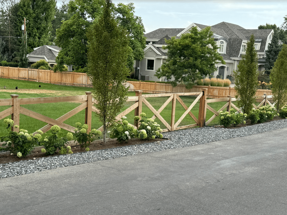 Screen Shot 2024-08-21 at 2.17.29 PM Short wooden fence with built on a Salt Lake City home's backyard.
