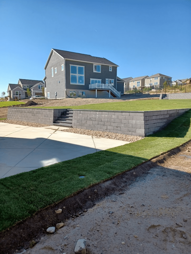 Screen Shot 2024-09-18 at 12.32.24 PM New retaining wall in front of a home