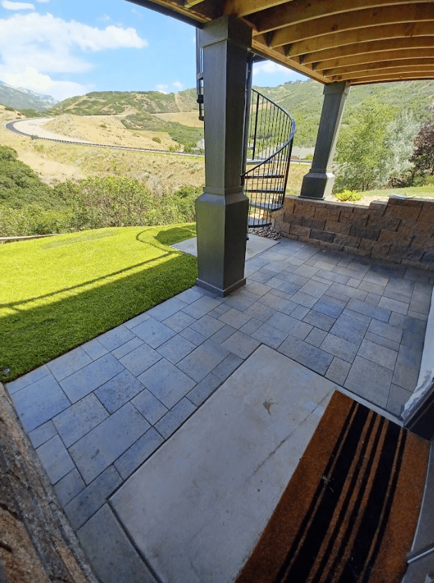 Screen Shot 2024-09-18 at 12.38.58 PM Backyard of a home with custom paving done