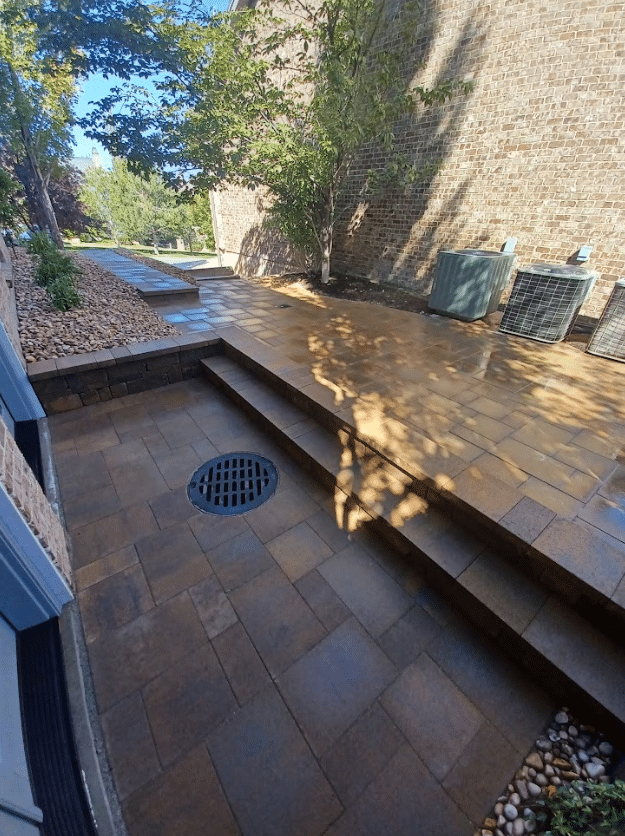 Screen Shot 2024-09-18 at 12.39.13 PM Paving for a home that gets floods with a drain