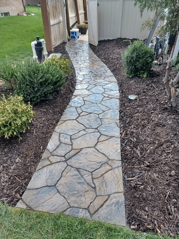 Screen Shot 2024-09-18 at 12.40.03 PM Custom walkway for a home on the side.