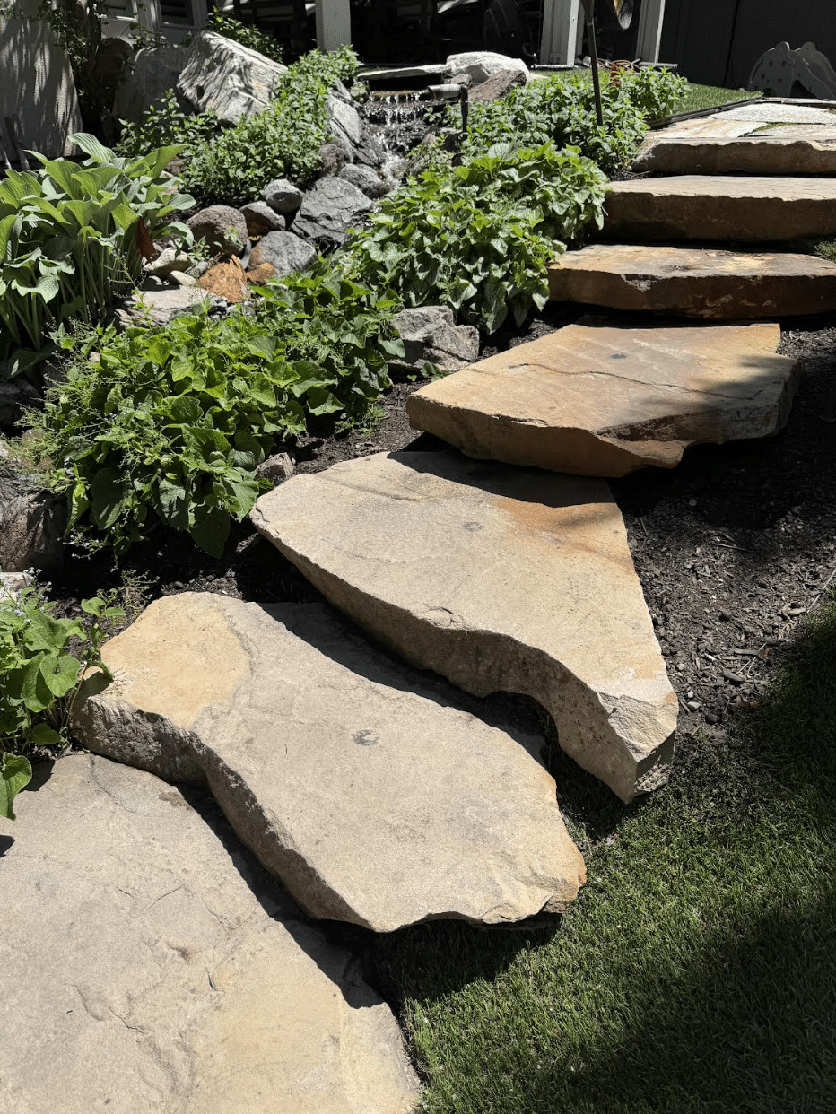 water_feature001 Rock steps and underneath a water feature for a home