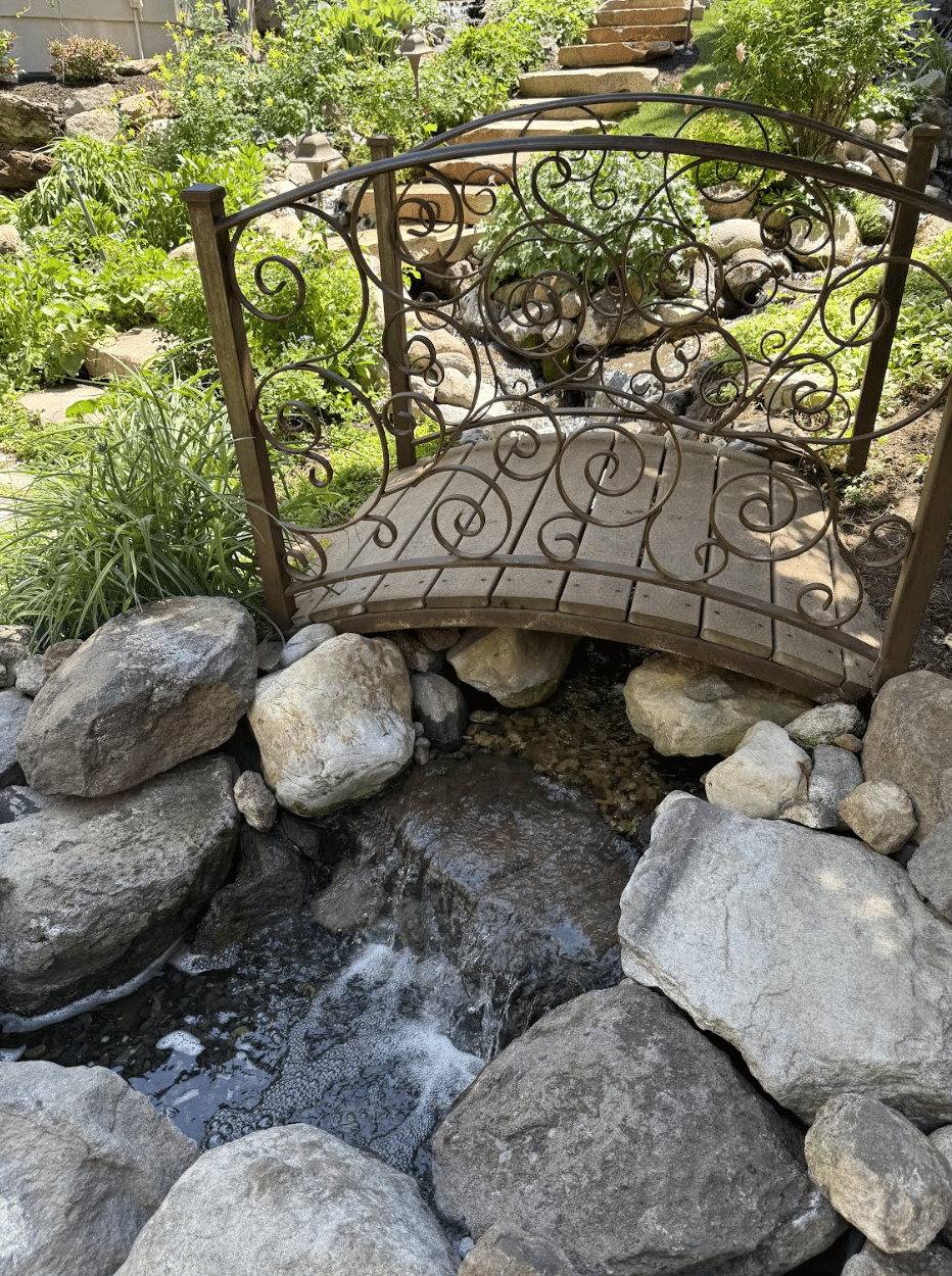water_feature002 small bridge going over a small river on a residential yard