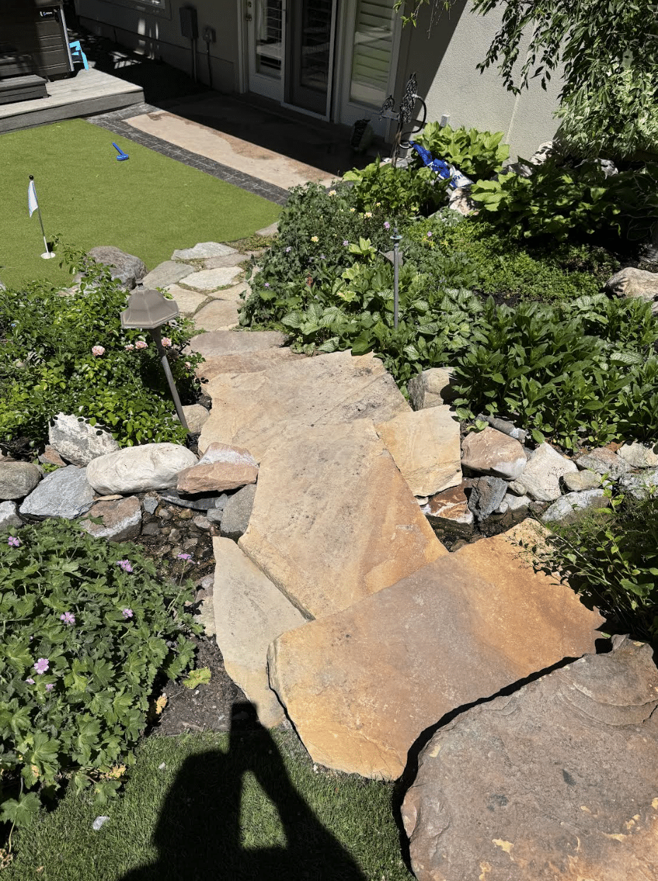 water_feature003 Stones of a water feature built on a residential home.